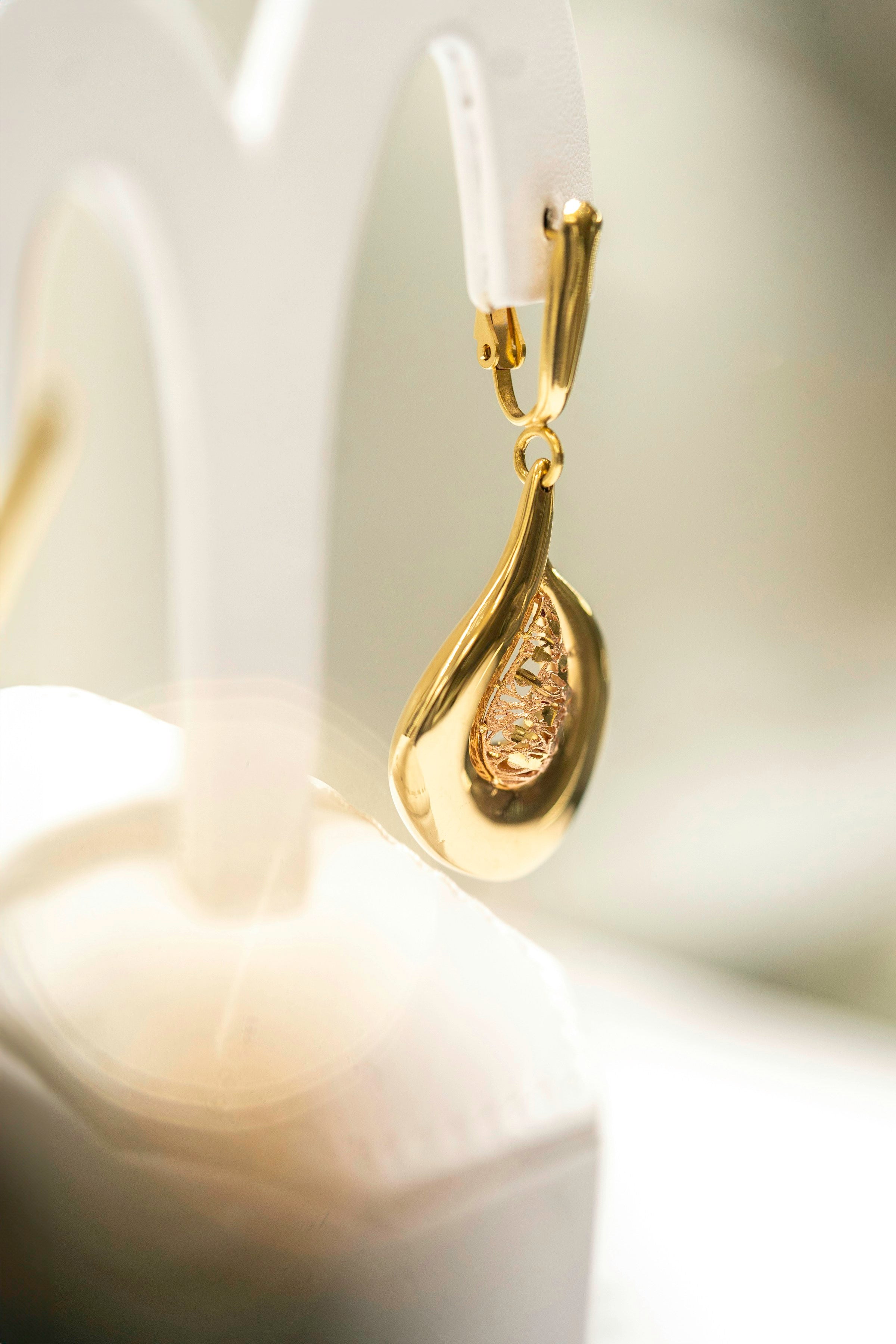 Close-up of premium gold earrings